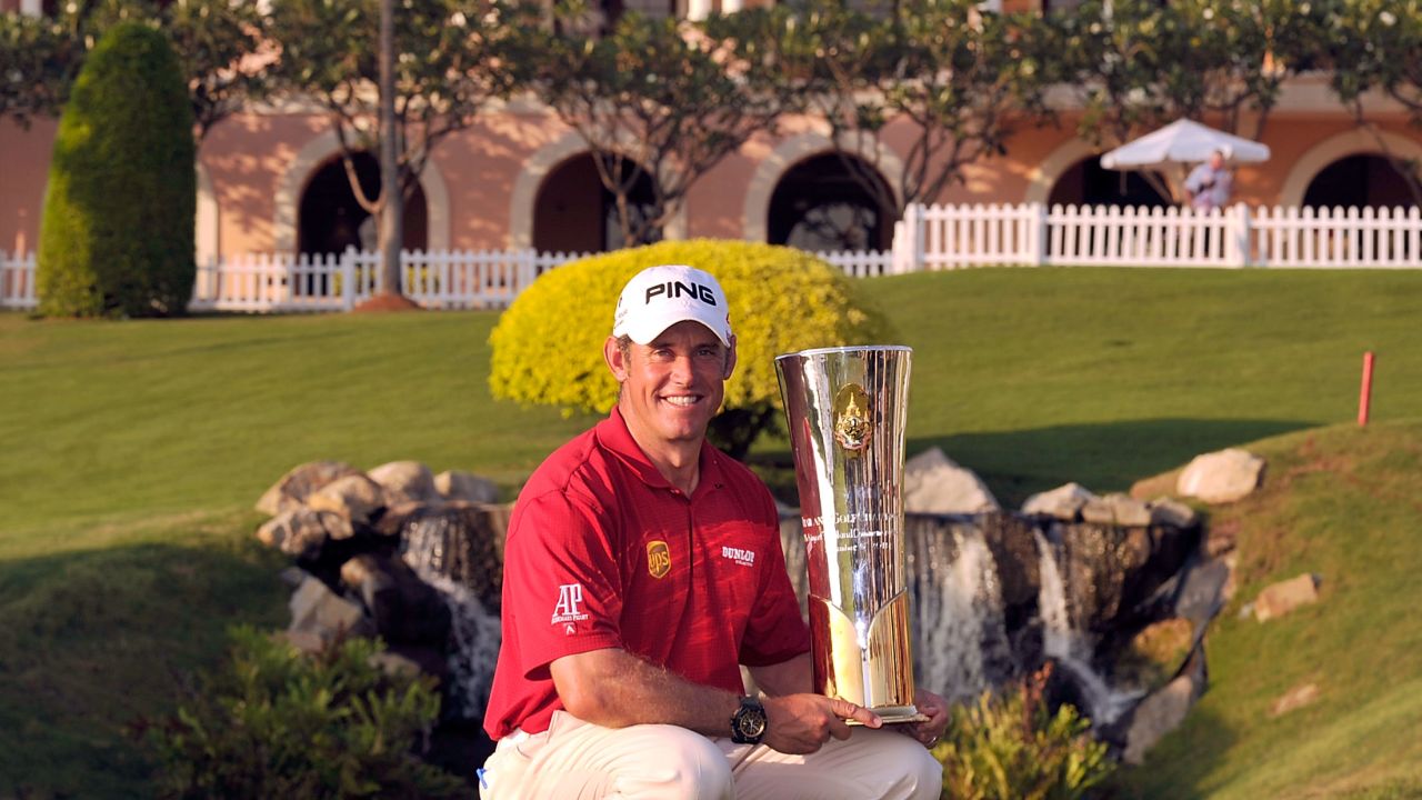 Lee Westwood displays the winning trophy at the inaugural $1 million Thailand Golf Championship.