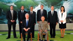 This photo taken on August 4, 2009 and released by North Korea's official Korean Central News Agency shows North Korean leader Kim Jong Il (Front R) posing with former US President Bill Clinton (Front L) and his delegation members in Pyongyang
