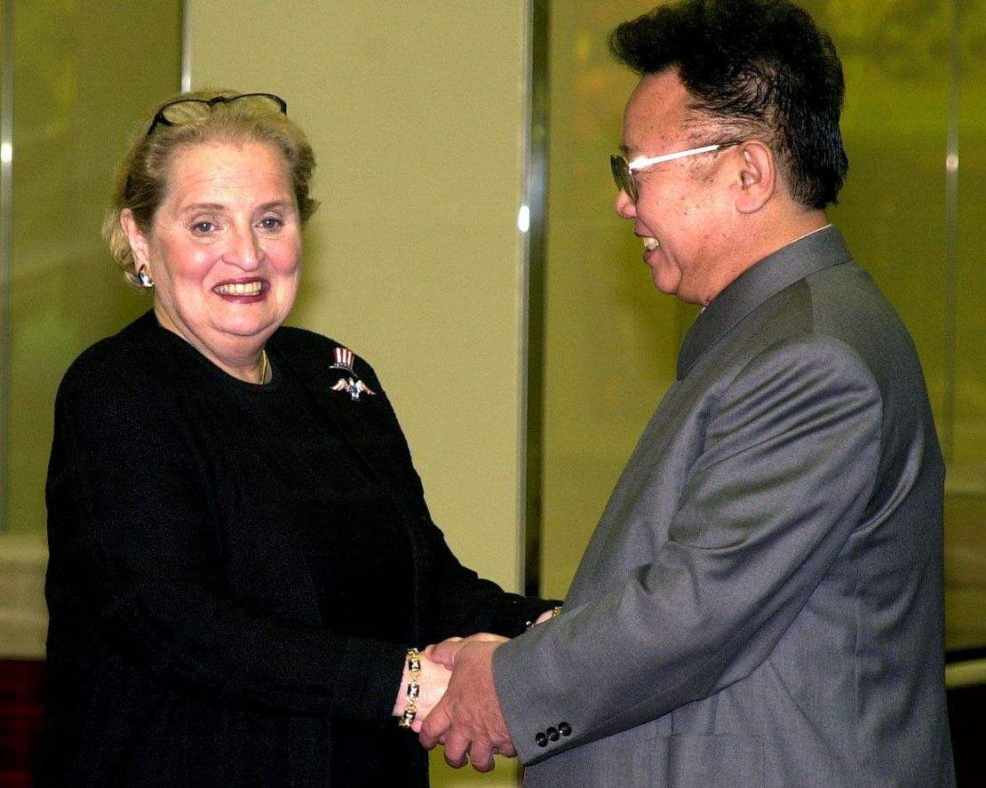 US Secretary of State Madeleine Albright (L) shakes hands with North Korean leader Kim Jong Il before a dinner in Pyongyang on 24 October 2000.