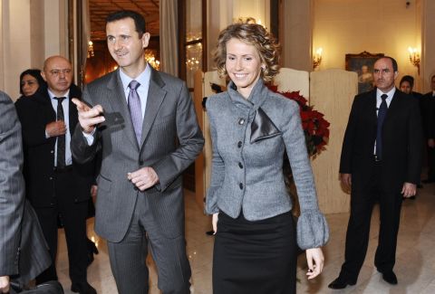 Bashar al-Assad and Asma al-Assad visit the December 2010 Monet exhibit in Paris.