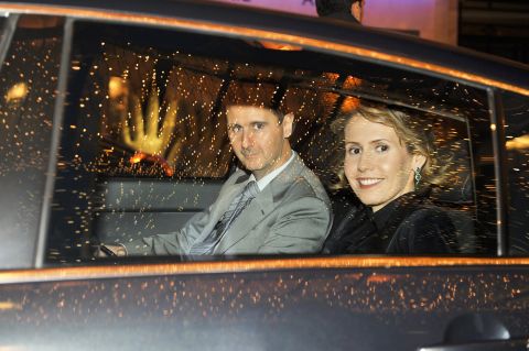 The Syrian first couple visit Paris in December 2010.