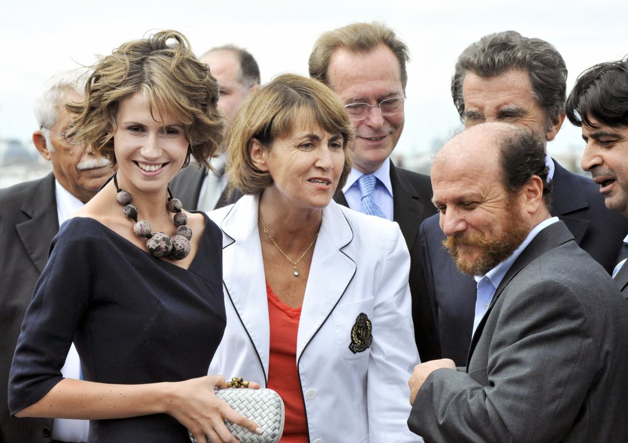 Asma al-Assad, left, chats with French Culture Minister Christine Albanel and Syrian artist Mustafa Ali on July 12, 2008, in Paris.