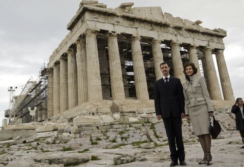 Syrian President Bashar al-Assad, left, and Asma al-Assad visit the Parthenon in Athens, Greece, in December 2003. 