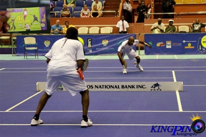 World champions past and present Sylvin Barnett, left, and Julian White show off their road tennis skills.
