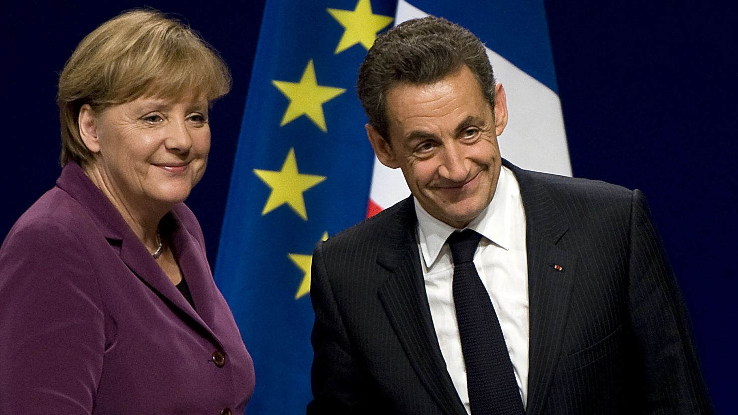 Hedge funds are betting that financial troubles aren't over for German Chancellor Angela Merkel, left,  and French President Nicolas Sarkozy.