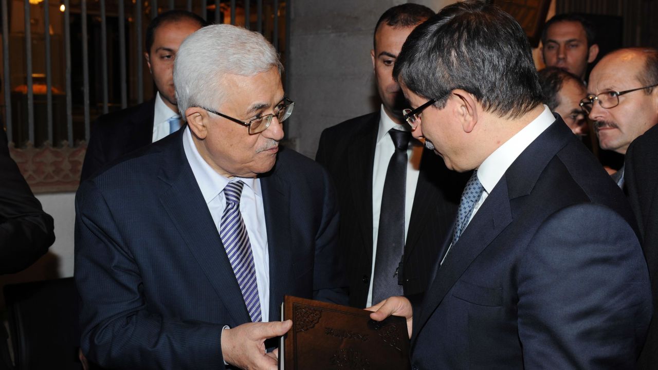 Palestinian President Mahmoud Abbas, left, talks with Turkish Foreign Minister Ahmet Davutoglu in December in Konya, Turkey.