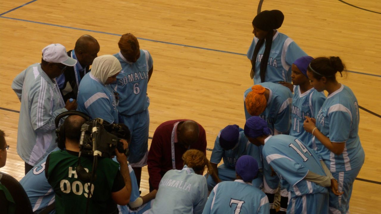 Coach Mohamed Sheekh gives instructions to his players during Somalia's game against Jordan on Monday, December 19.