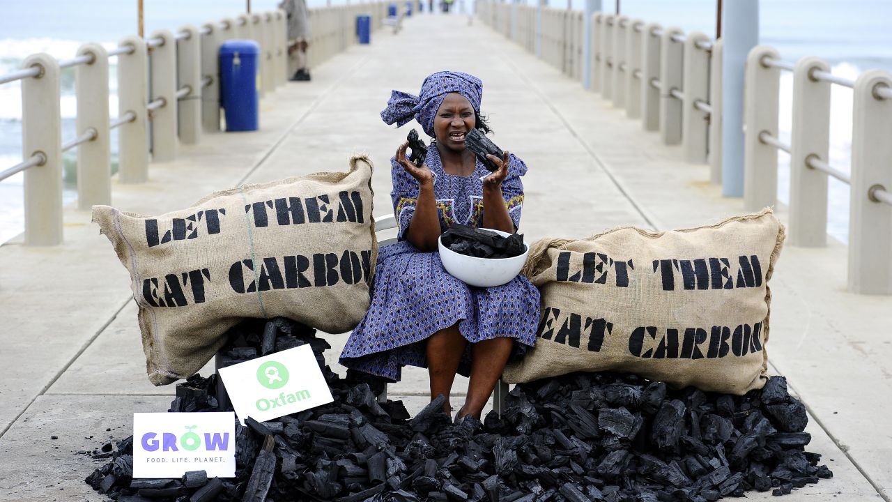 An Oxfam activist  in a protest aimed at the COP17 conference on climate change on December 9, in Durban, South Africa.