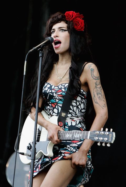 Singer Amy Winehouse was found dead July 23 in her London apartment. The 27-year-old performer infamous for her arrests and substance abuse problems died of alcohol poisoning. <a href="http://articles.cnn.com/2011-07-23/entertainment/amy.winehouse.dies_1_drug-overdoses-winehouse-spokesman-chris-goodman-singer-amy-winehouse?_s=PM:SHOWBIZ">Full story</a>