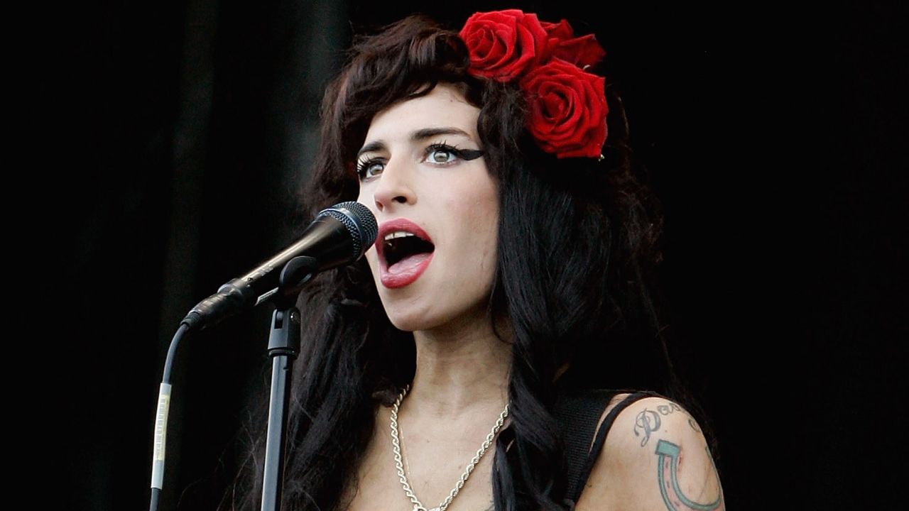 A wedding dress Amy Winehouse wore at her 2007 nuptials has been taken from her former home. 
