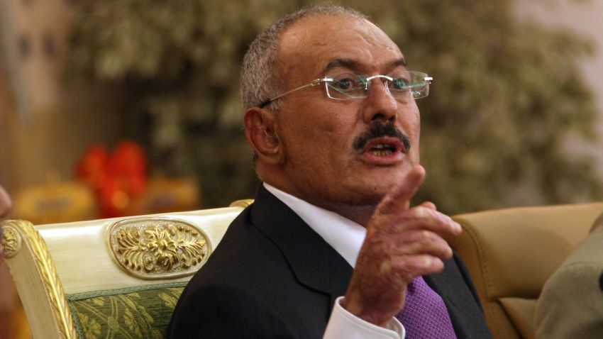 Yemeni President Ali Abdullah Saleh speaks on December 24, 2011, in the capital Sanaa as security forces and backers of Yemen's embattled President shoot dead seven protesters during the 'March for Life'. Tens of thousands of protesters who set off from the southern city of Taez on December 20 for the 270-kilometre (167-mile) march to the capital had arrived in Sanaa in mid-afternoon but were blocked in a southern suburb. AFP PHOTO/ MOHAMMED HUWAIS (Photo credit should read MOHAMMED HUWAIS/AFP/Getty Images) 