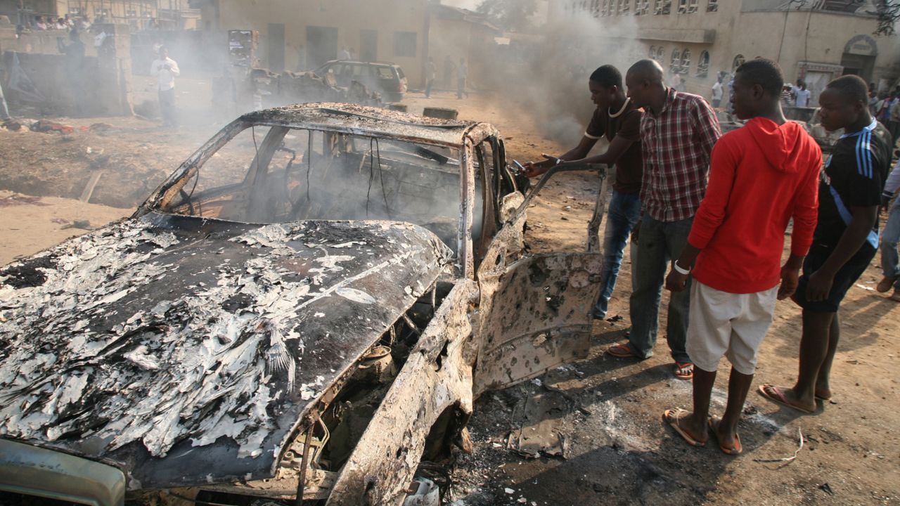 The devastating scene outside St Theresa Catholic Church near the Nigerian capital Abuja on Sunday.