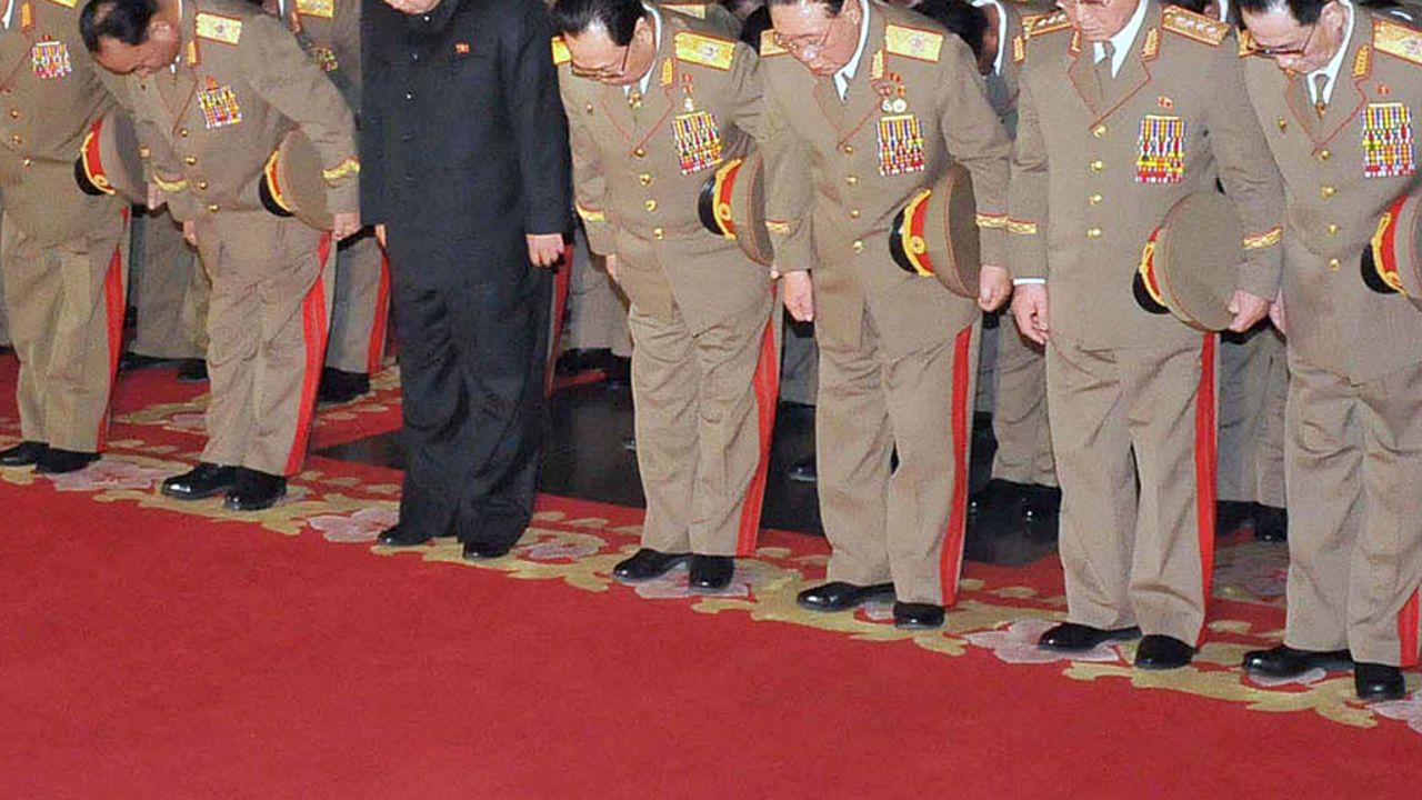 Senior North Korean officials and new leader Kim Jong Un pay their respects to Kim Jong Il.  