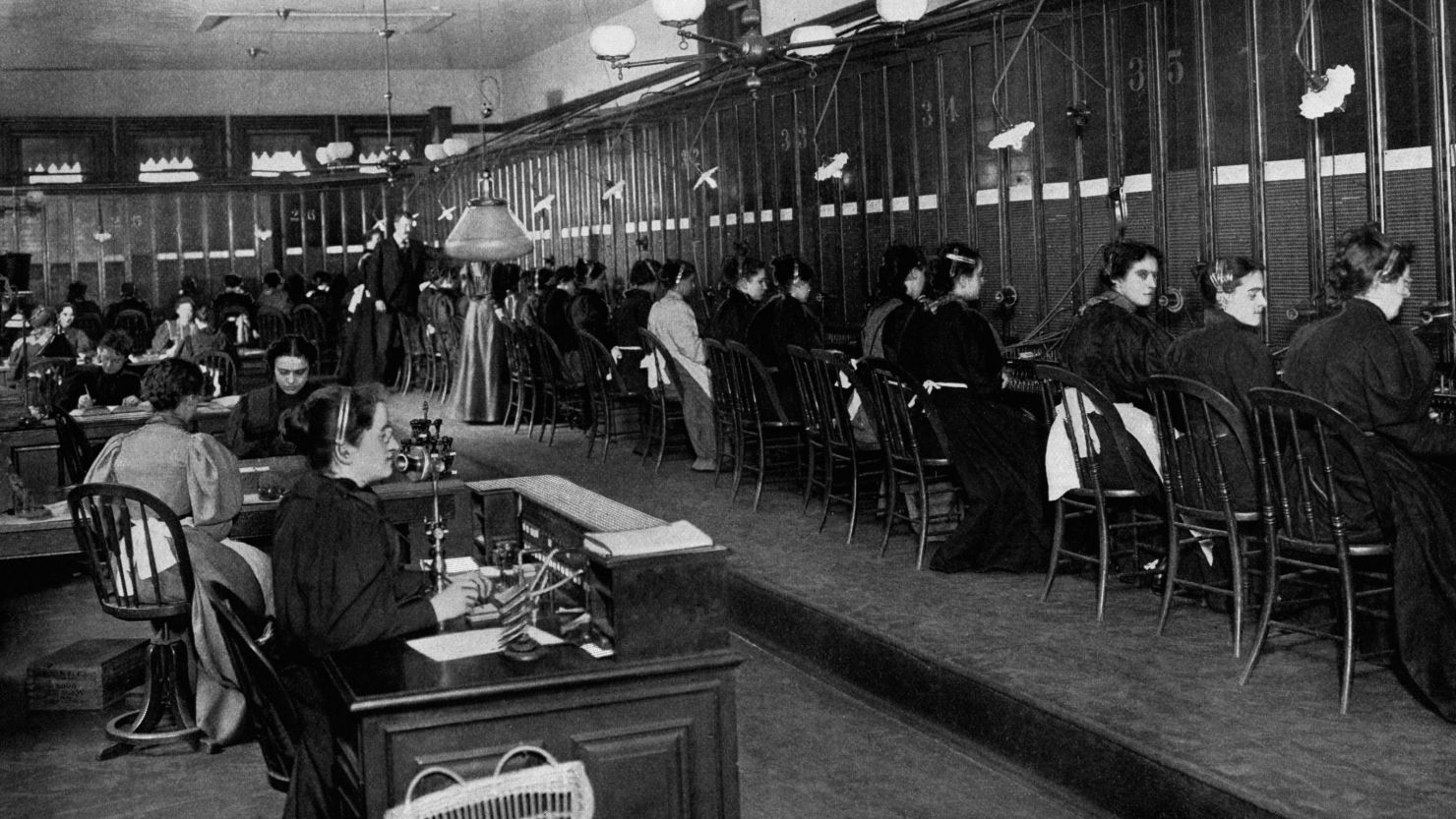 LZ Granderson doesn't want to turn the clock back to 1899, when these telephone operators ran the New York central telephone exchange, but he would like to speak to an actual human being. 