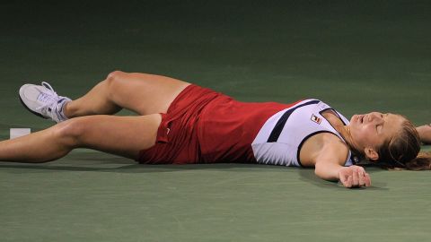 Anna Chakvetadze collapses on court during her match against Caroline Wozniacki in Dubai in February. 