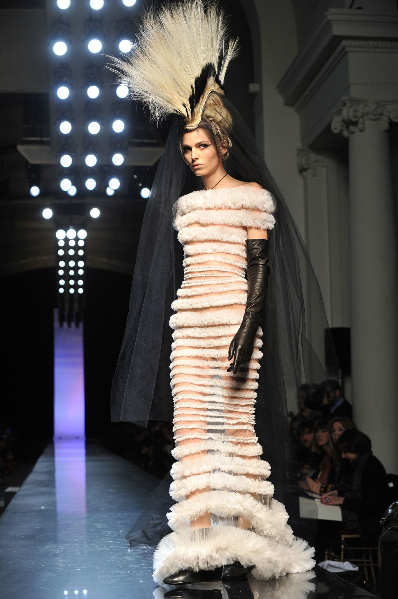 Gaultier's approach to casting and production was equally progressive. He's one of few designers to consistently feature models of color on the catwalk and, in 2011, he was one of the first designers to work with trans model Andreja Pejic (who then went by Andrej). (Pictured: Andreja Pejic walks Jean Paul Gaultier Haute Couture Spring-Summer 2011) 