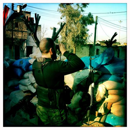 A Free Syrian Army checkpoint is pictured in the liberated quarter of Baba Amr in Homs. All photos taken between December 15 and 20 with an iPhone 4S using the Hipstamatic app.