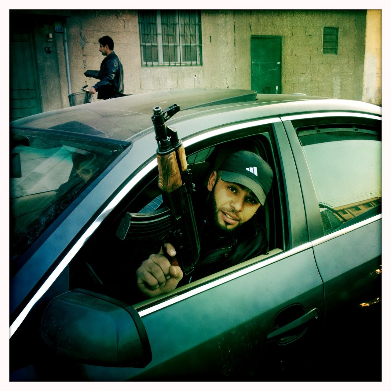 A freelance journalist and filmmaker -- who is not named for his own security -- took the following photos in Homs between December 15 and 20. Here an armed member of the Free Syrian Army shows the Kalashnikov he took with him the day he deserted. All photos were taken with an iPhone 4S using the Hipstamatic app.