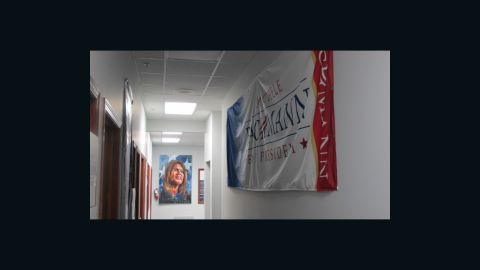 An impressionist painting of Michele Bachmann hangs in her campaign office, the same one John McCain used in 2008.