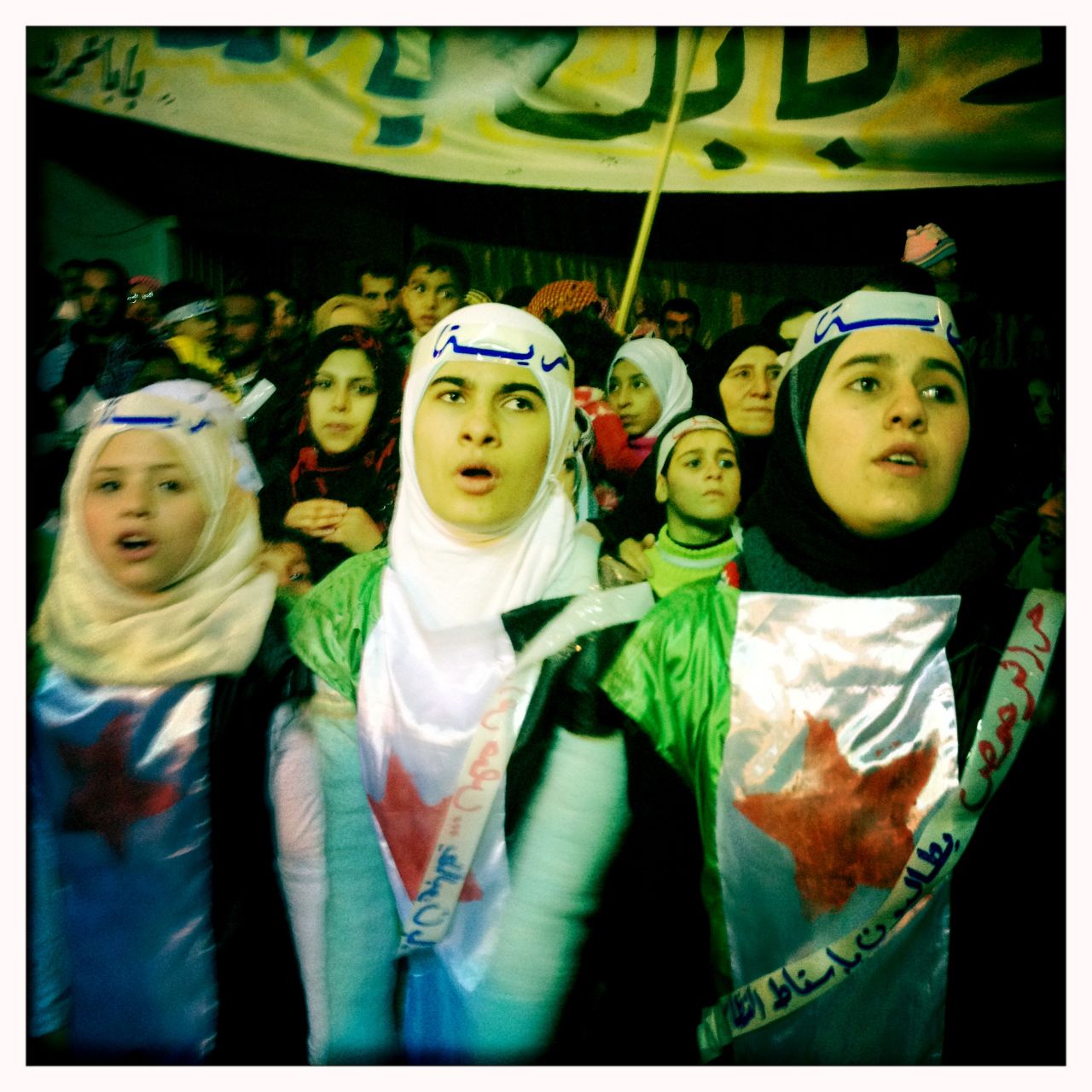 A night demonstration takes place in the Baba Amr neighborhood.
