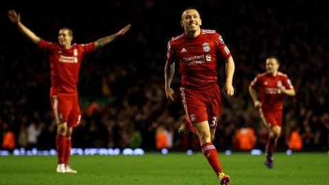 Craig Bellamy celebrates his second goal in Liverpool's 3-1 victory over Newcastle.