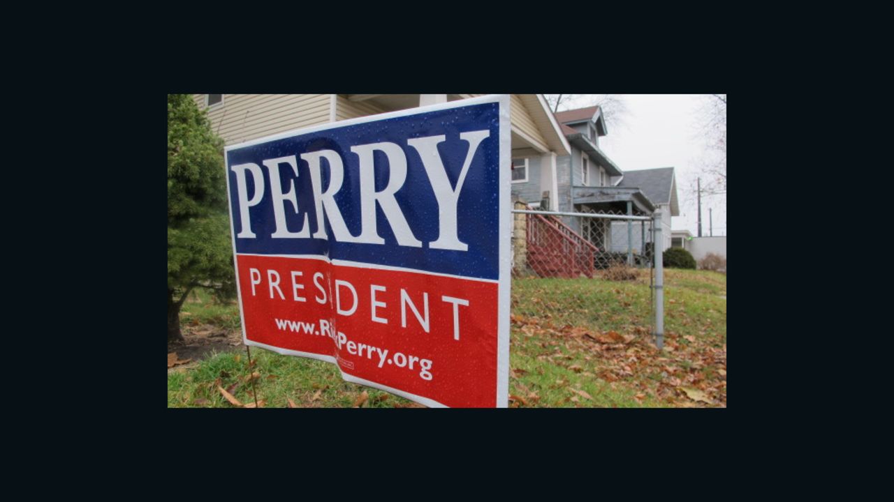 Potts, who spends about 20 hours a week making calls, also displays a Perry campaign sign in her yard.