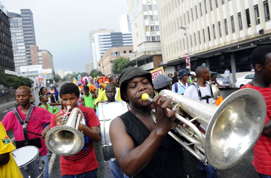 In Johannesburg, musicians and dancers took to the streets for the traditional New Year's Eve carnival.