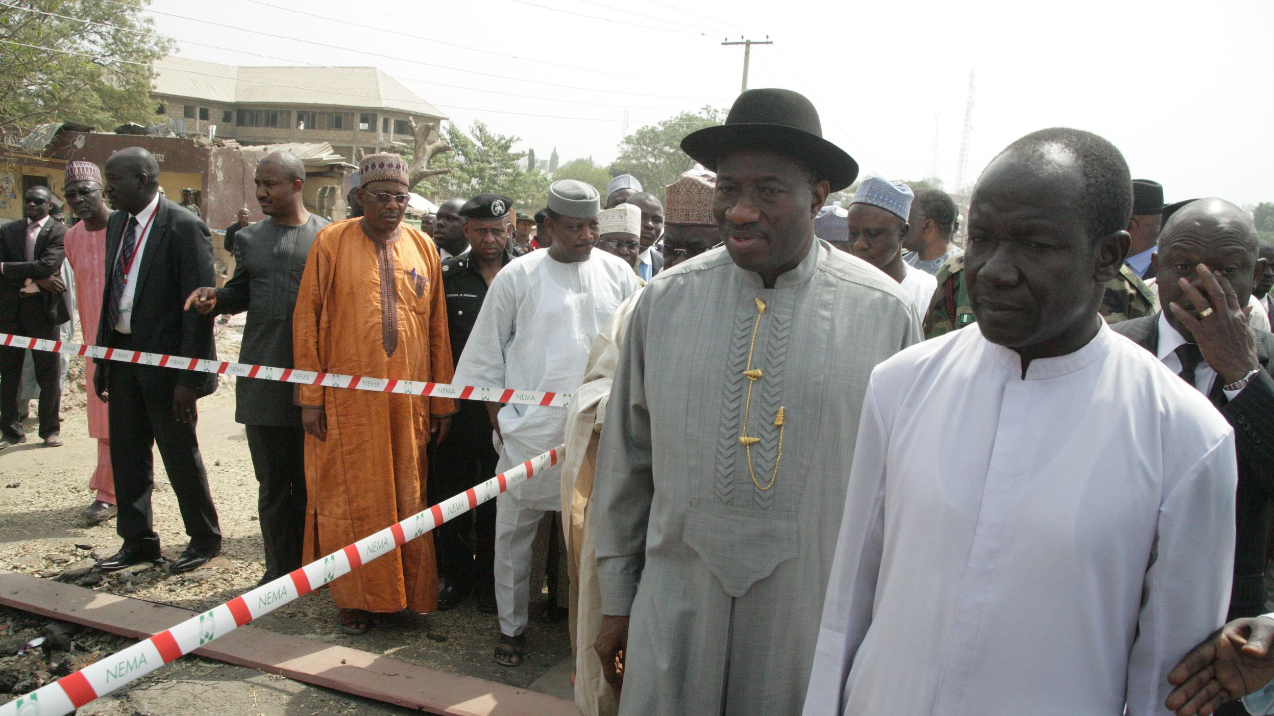 Nigerian President Goodluck Jonathan, wearing black hat, visits the damaged St. Theresa Catholic Church in Madalla on Saturday. 