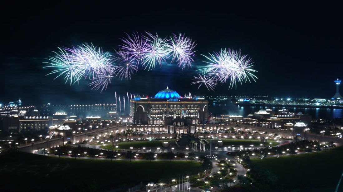Fireworks illuminate the Emirates Palace and Marina mall as 2012 arrives in Abu Dhabi.