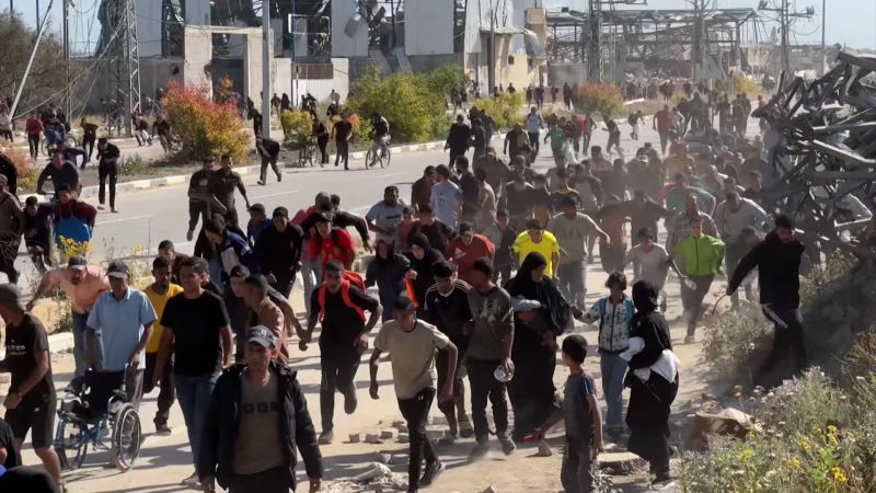 Video: Warning shots and grenades used to disperse Palestinians seeking aid