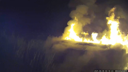 112588_woman in burning car horizontal thumb.png