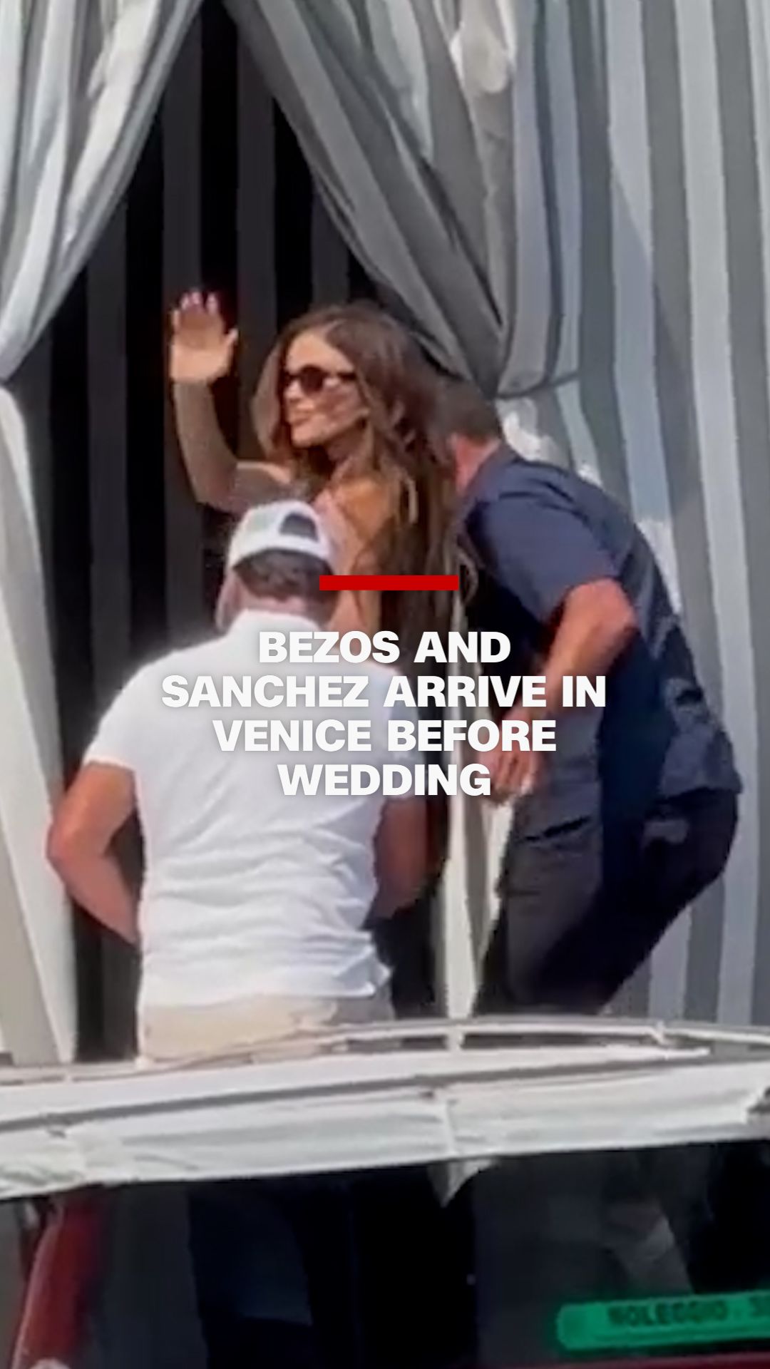 112801_Bezos and Sanchez VERT.THUMB.jpg