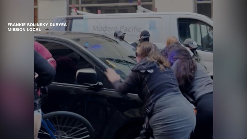 https://media.cnn.com/api/v1/images/stellar/prod/113022-icevehiclerunsoverprotesters-horizontal-thumb.jpg?c=16x9&q=w_800,c_fill