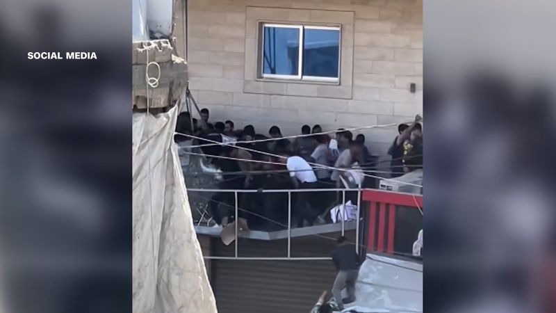 Balcony collapses in Gaza under weight of crowd scrambling for aid