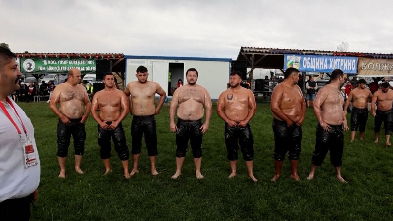 Watch: Oil wrestlers slide to victory