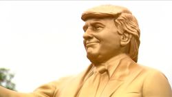 114038_trump bitcoin statue_clean.00_00_01_19.Still001.jpg