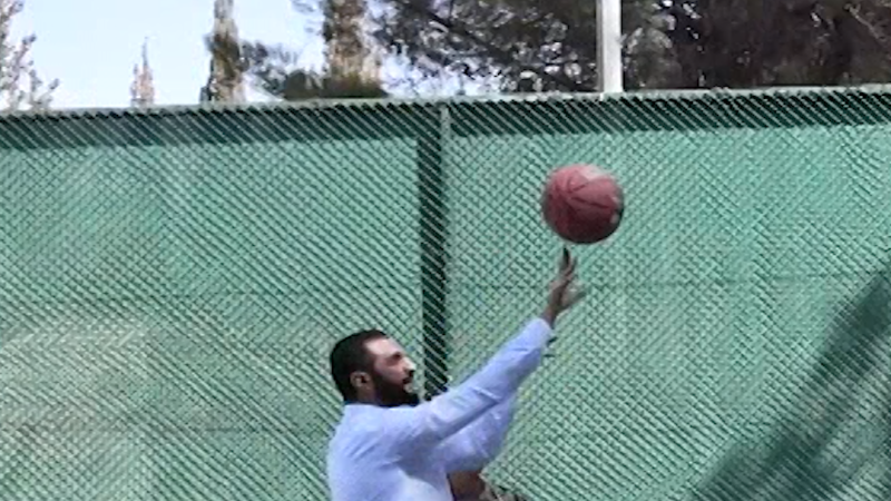 Syrian president plays basketball with US military officials