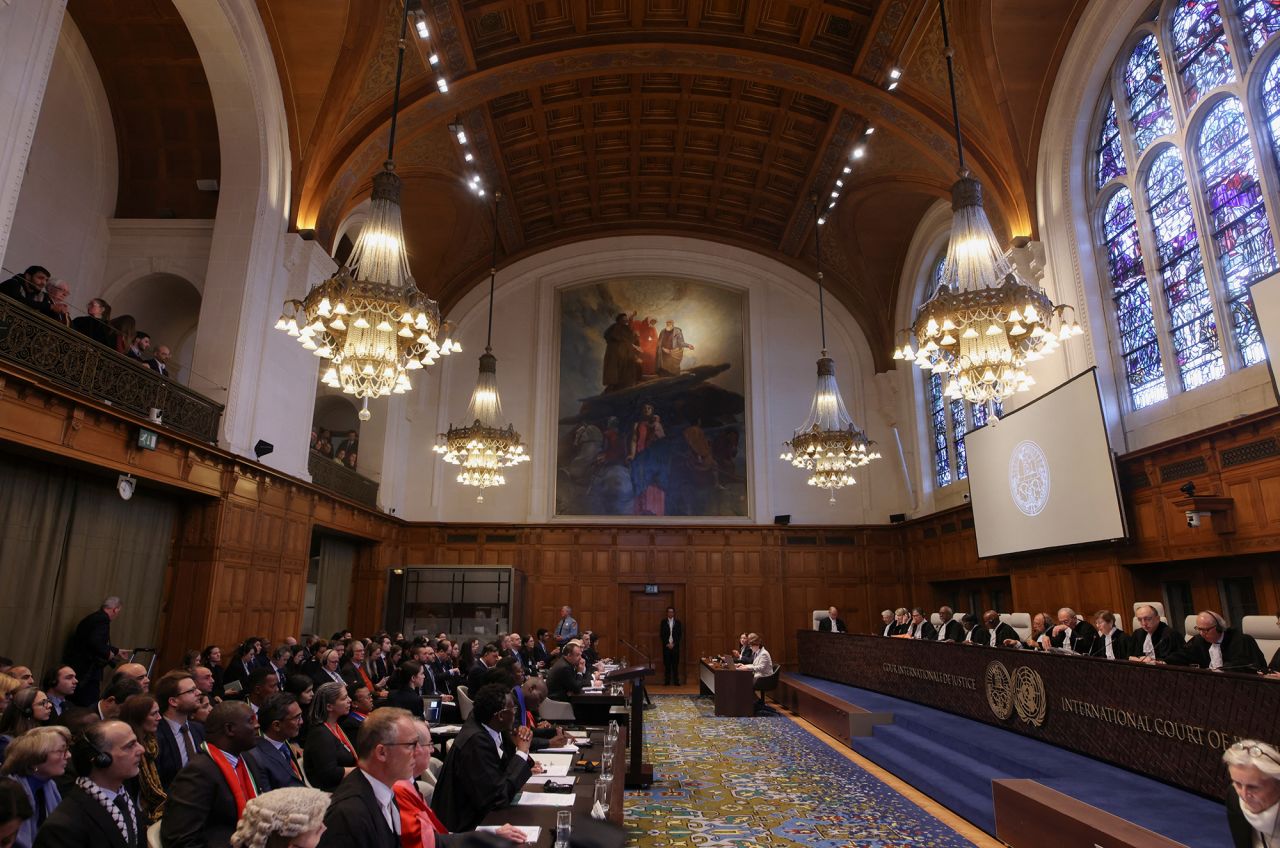 People sit inside the International Court of Justice (ICJ) in The Hague, Netherlands, on January 11.