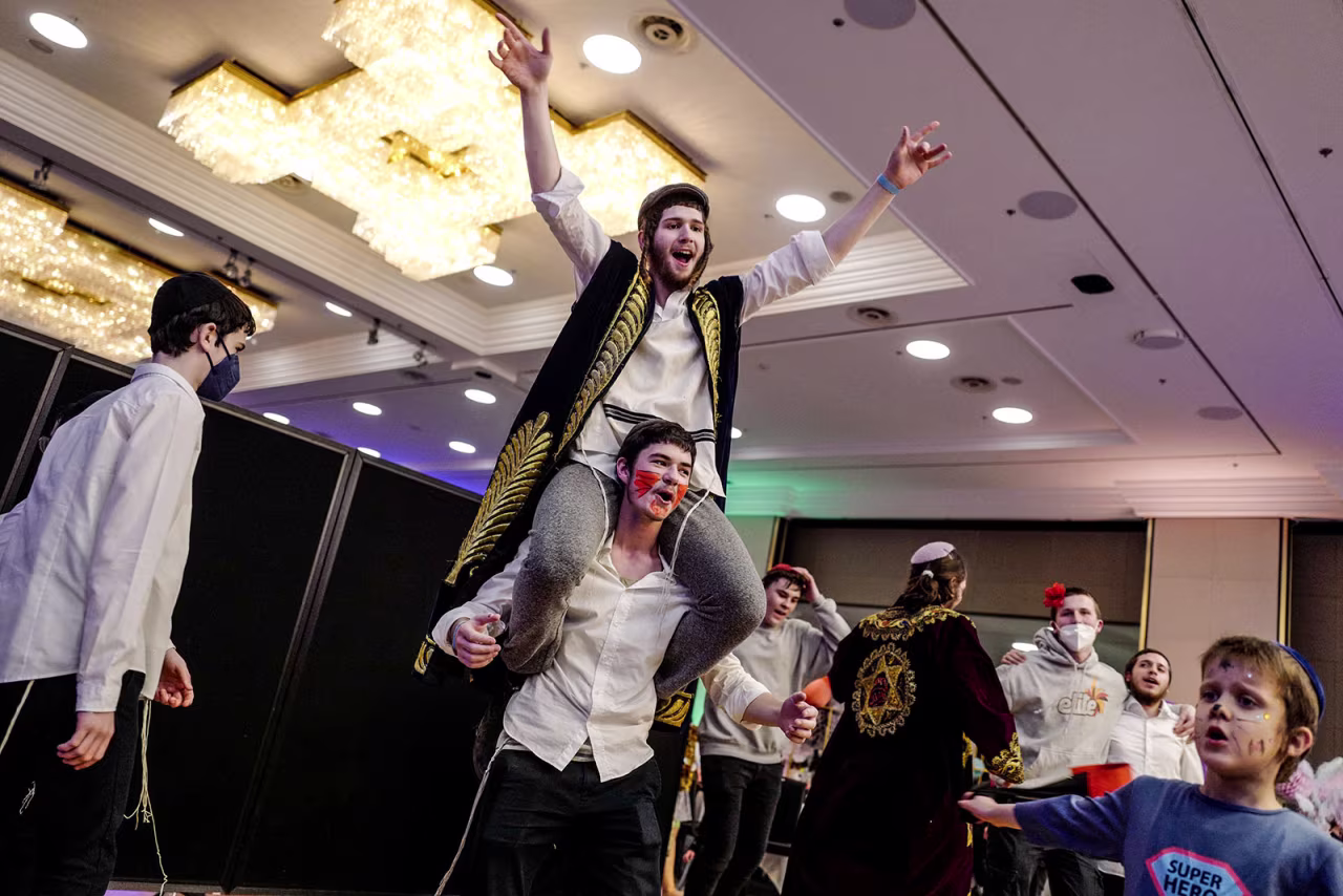 The Chabad Berlin community welcomes newcomers from Ukraine for their first Purim festival away from home in Berlin, Germany, on Thursday.