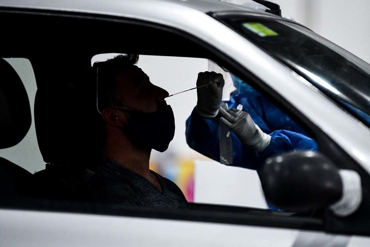 A health worker administers a Covid-19 test at the Costa Salguero convention center, in Buenos Aires, on April 5.