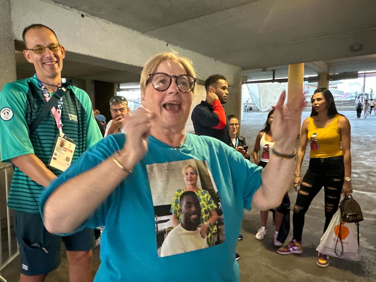 Kenny Bednarek’s mom, Mary, reacts as she watches her son win silver in the men’s 200m at the Stade de France on Thursday.