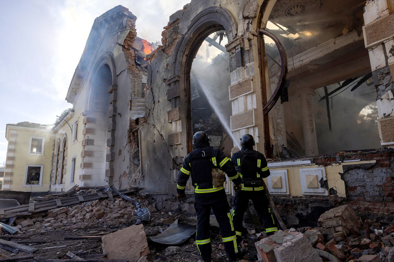 Firefighters work at the scene of a Russian missile strike that destroyed a train station in Kostiantynivka, Ukraine, on February 25. 