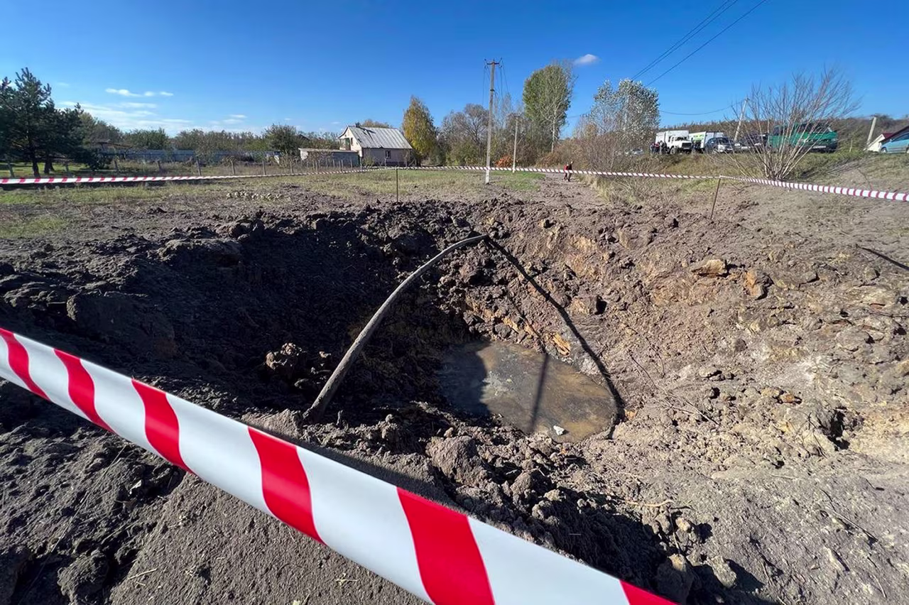 This handout photo released by Vyacheslav Gladkov, governor of the Belgorod region, claims to show a crater created by shelling outside Belgorod, Russia, on October 16.  