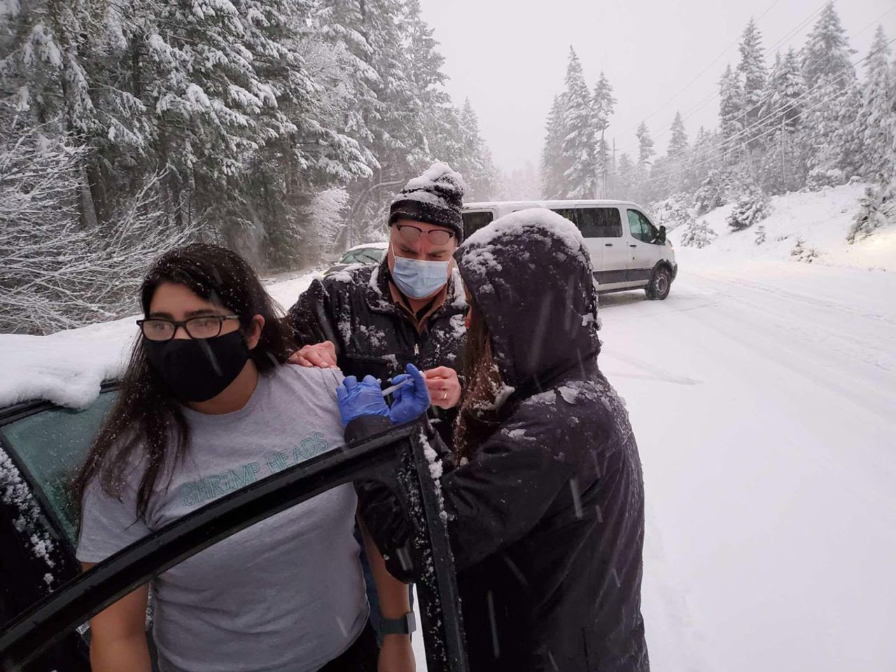 Josephine County Public Health workers administered leftover vaccine doses to motorists who were stranded in a snowstorm.