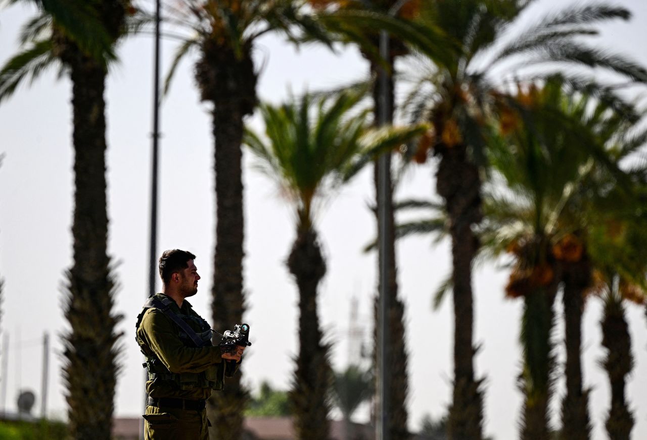 A soldier stands guard outside the Hatzerim Air Base near Beersheba in Israel's southern district on November 24.