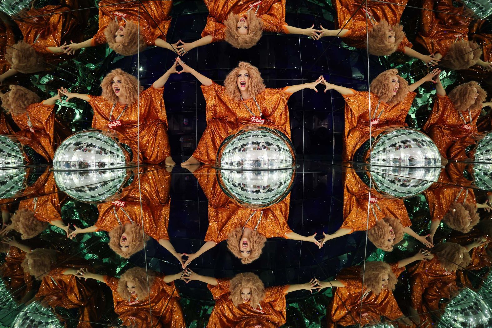 Musical comedy star Miss Frisky is reflected in mirrors at Camera Obscura & World of Illusions while promoting her show at the Edinburgh Festival Fringe art festival in Edinburgh, Scotland, on August 13.