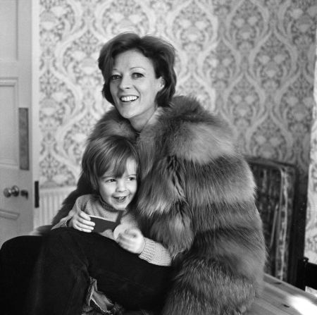 Smith holds her eldest son Chris Larkin in 1970.