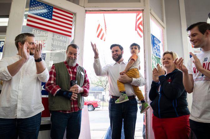 Vance holds his son Vivek as he arrives at a get-out-the-vote rally in Batavia, Ohio, in November 2022. Vance and his wife, Usha, have three children: Ewan, Vivek and Mirabel.