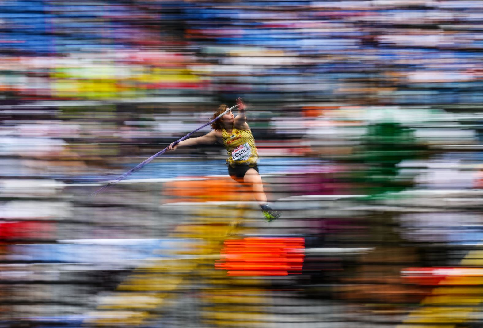 In this photo, taken with a slow shutter speed, Germany’s Jana Marie Lowka throws a javelin during the European Athletics Championships on Monday, June 10.