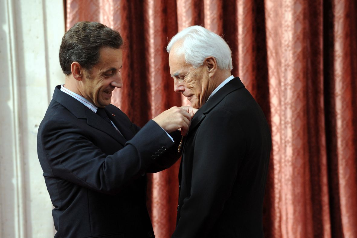 Former French president Nicolas Sarkozy, left, awarded Armani with a prestigious Legion D'Honneur medal in 2008 — the highest national order of merit in France.